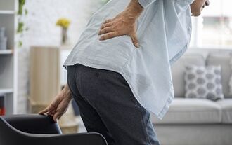 causas de dor nas costas na região lombar